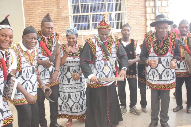 Archbishop and Governor Lele Lafrique show-casing their dancing styles