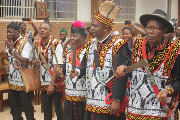 Archbishop flanked by NW Governor and Msgr Kintang dancing to the Samba rhythm