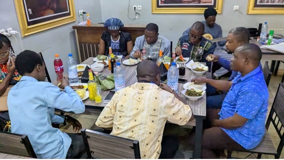 Cross section of staff refreshing after a day’s brainstorming